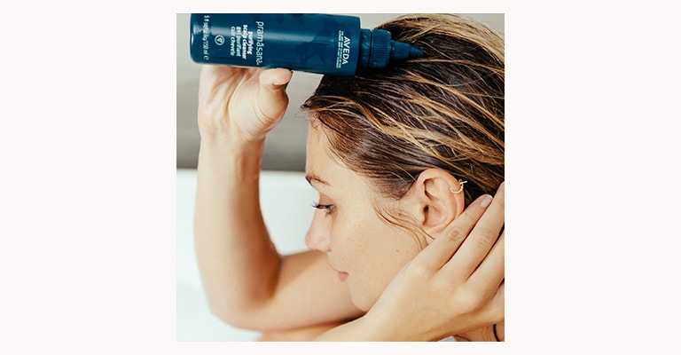 Apply pramasana purifying scalp cleanser to wet or dry scalp